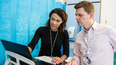 Doctors Working Together On A Ward