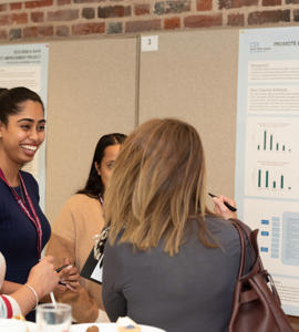 Cambridge Delegates Laughing At Poster Comp