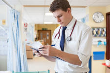 Doctor Checking Notes