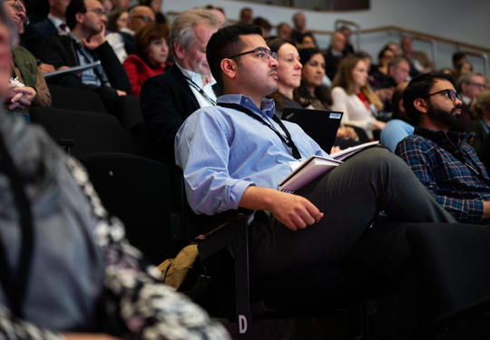 Attendees Watching Conference