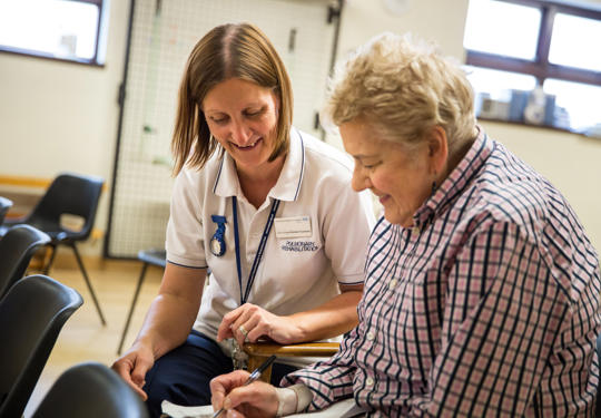 Elderly patient with healthcare worker