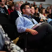 Attendees Watching Conference (1)