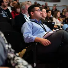 Attendees Watching Conference (1)